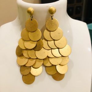 Gold earrings , costume jewelry